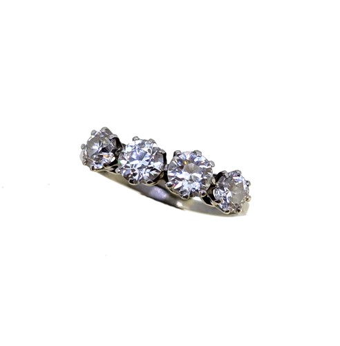 Lot 147 - A four stone diamond ring