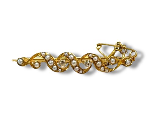 Lot 303 - A split pearl and diamond brooch, tested as...