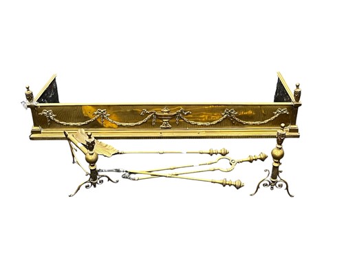 Lot 664 - A brass Neoclassical style fender and fire...