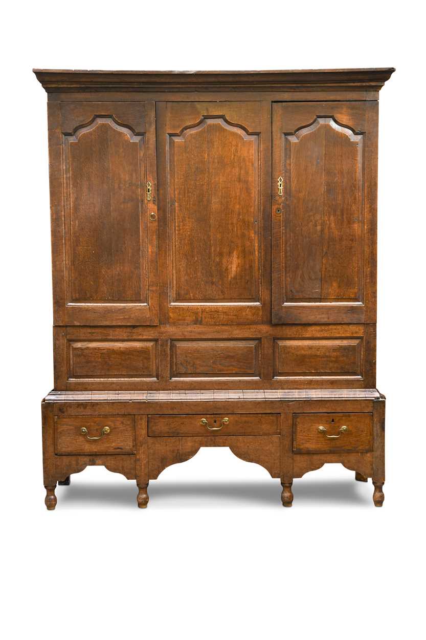 Lot 253 - An oak livery cupboard, 18th century