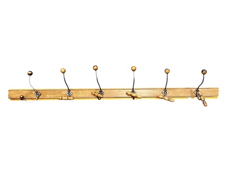 Lot 668 - A six hook hall coat rack, the scrolled metal...