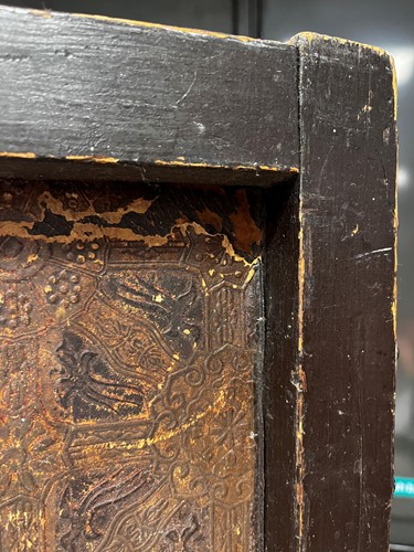 Lot 307 - An embossed Spanish hand painted leather four fold screen, 19th century