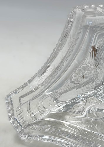 Lot 3 - Tiffany & Co., a group of four polished glass 'dolphin' candlesticks