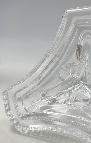 Lot 3 - Tiffany & Co., a group of four polished glass 'dolphin' candlesticks