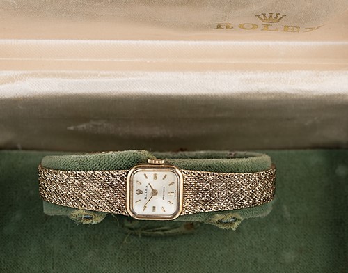 Lot 264 - Rolex - A 9ct gold 'Precision' wristwatch