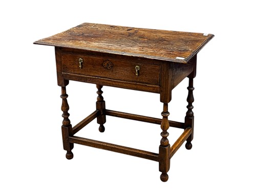 Lot 637 - An 18th century oak side table, with single...