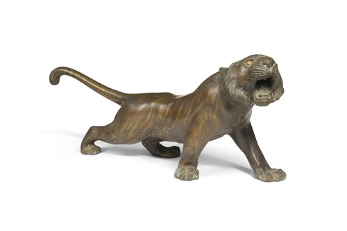 Lot 75 - A Japanese bronze model of a tiger, late Meiji Period, circa 1900