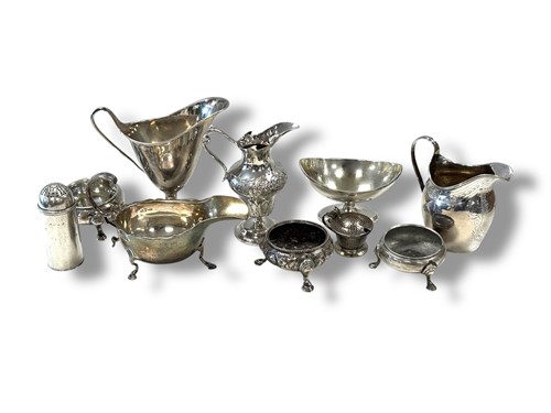 Lot 358 - A collection of silverware including cream...