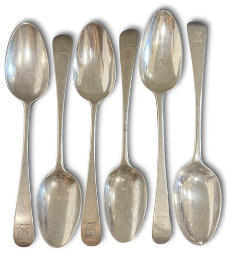 Lot 429 - A collection of six George III 18th century silver bottom marked tablespoons