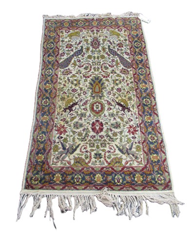 Lot 811 - Two Persian Tabriz style hand-knotted rugs,...
