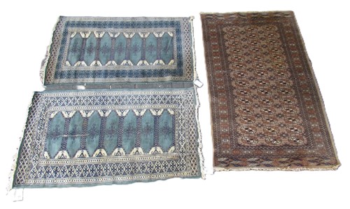 Lot 813 - Three Bokhara rugs, 160 x 93cm 126 x 77cm 132...