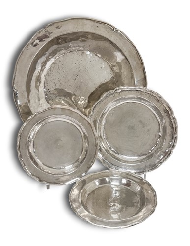 Lot 404 - Four Peruvian metalwares dishes