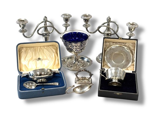 Lot 365 - A collection of silverware including caster,...