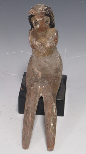 Lot 172 - An Egyptian wood seated female