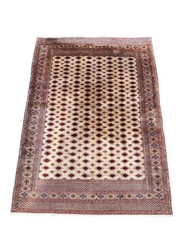Lot 795 - A Bokhara rug, with repeating lozenge...