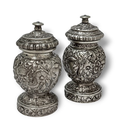 Lot 401 - A pair of (probably) Indian metalwares pepper grinders