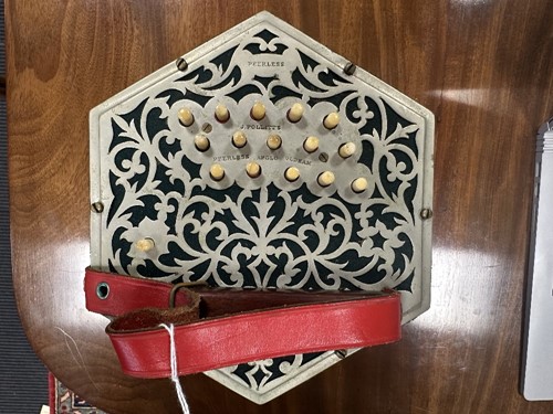 Lot 586 - Pollitt's of Oldham, a 32-button Peerless Anglo concertina