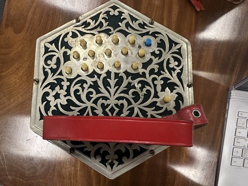 Lot 586 - Pollitt's of Oldham, a 32-button Peerless Anglo concertina