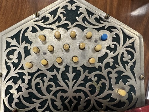 Lot 586 - Pollitt's of Oldham, a 32-button Peerless Anglo concertina