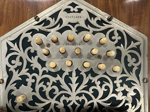 Lot 586 - Pollitt's of Oldham, a 32-button Peerless Anglo concertina