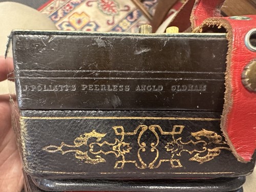 Lot 586 - Pollitt's of Oldham, a 32-button Peerless Anglo concertina
