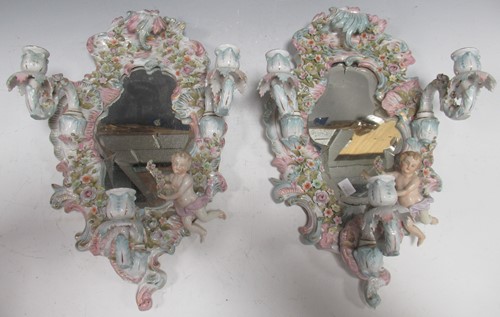 Lot 86 - A pair of Dresden three-branch wall mirrored...