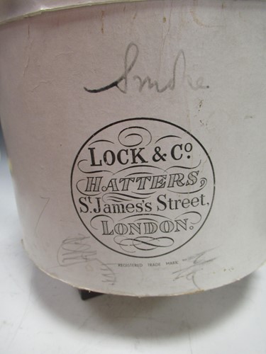 Lot 97 - Lock and Co grey top hat, in white card Lock &...