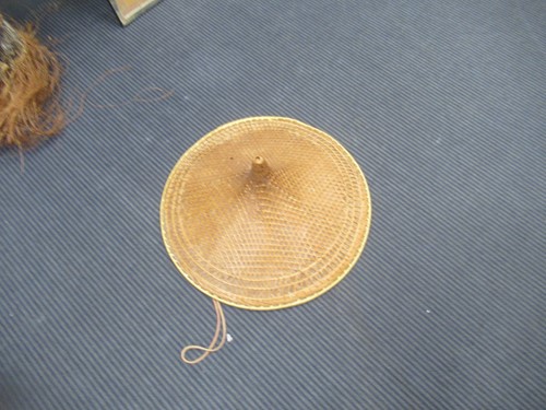 Lot 140 - Two Chinese straw hats, a Chinese wedding...