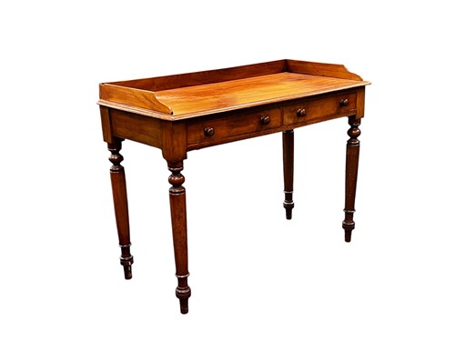 Lot 703 - A 19th century mahogany washstand, the three...