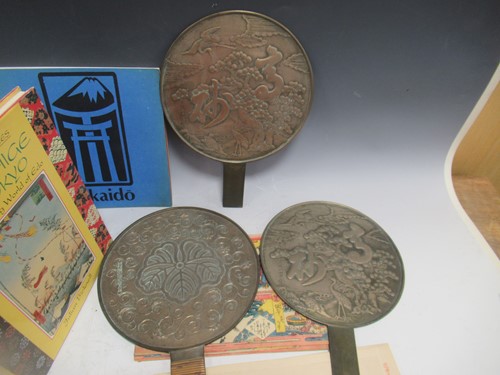 Lot 60 - Three Japanese polished bronze hand mirrors