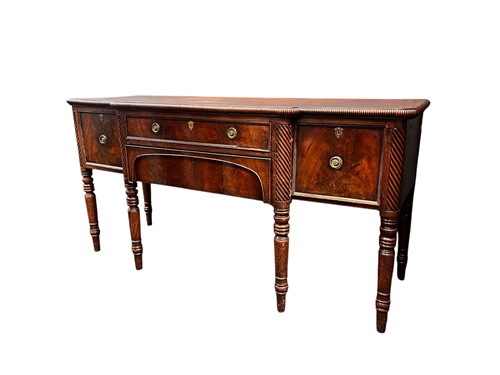 Lot 712 - A Regency mahogany sideboard, possibly...