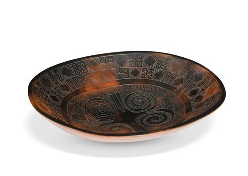 Lot 49 - Siddig El Nigoumi (1931-1996), a smoke-fired and burnished earthenware dish