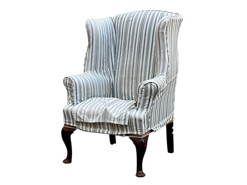 Lot 655 - A 19th century walnut wing armchair with...