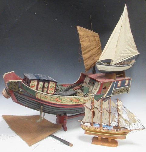 Lot 133 - A polychrome painted wooden model of a Chinese...