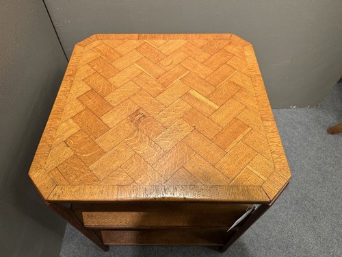 Lot 209 - An Art Deco pale oak book table in the manner of Heal's, circa 1930
