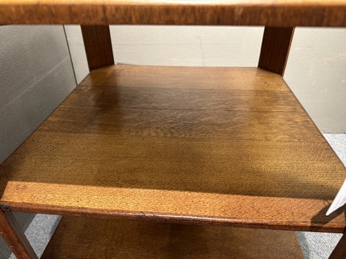 Lot 209 - An Art Deco pale oak book table in the manner of Heal's, circa 1930