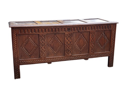 Lot 621 - A late 17th century four panelled oak coffer,...