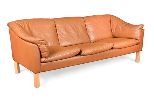 Lot 248 - A Danish brown leather three-seater sofa