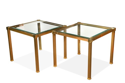 Lot 273 - A pair of 20th century glass topped brass side tables, probably Italian