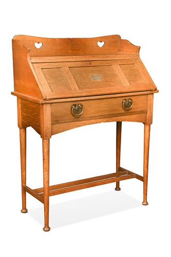 Lot 186 - Attributed to William Birch for Liberty & Co., an Arts & Crafts oak bureau