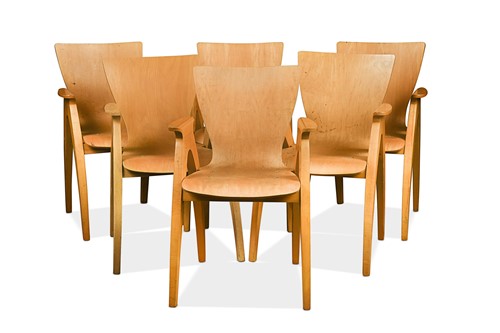 Lot 275 - In the manner of Philipppe Starck, a set of six beech chairs