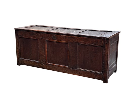 Lot 629 - An 18th century oak coffer, with triple...