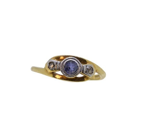 Lot 37 - An 18ct gold sapphire and diamond three stone crossover ring