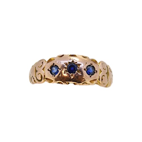 Lot 5 - A 9ct gold sapphire three stone ring