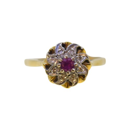 Lot 96 - An 18ct gold ruby and diamond cluster ring