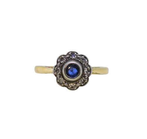 Lot 57 - A sapphire and diamond cluster ring