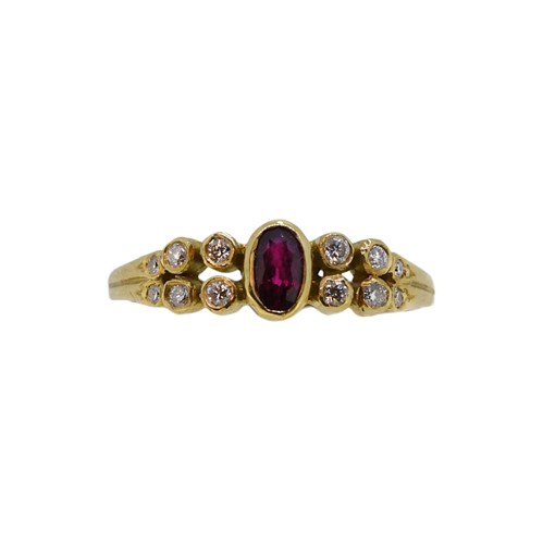 Lot 67 - An 18ct gold ruby and diamond ring