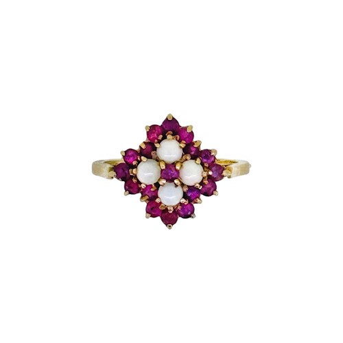Lot 11 - A 9ct gold opal and ruby ring
