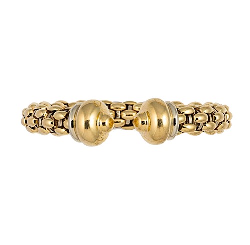 Lot 174 - A two colour torque bangle