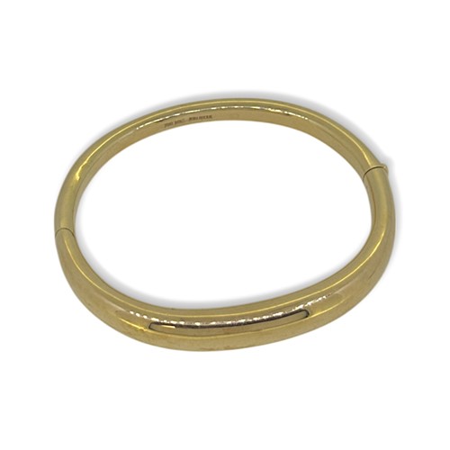 Lot 141 - A modern tapered bangle
